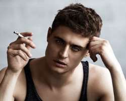 Max Irons smoking